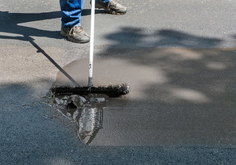 How Asphalt Sealing Protects Your Driveway From Damage